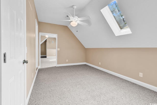 6161 Inman Cir, Conway, SC 29526 - additional living space with a ceiling fan, a skylight, baseboards, carpet flooring, and lofted ceiling