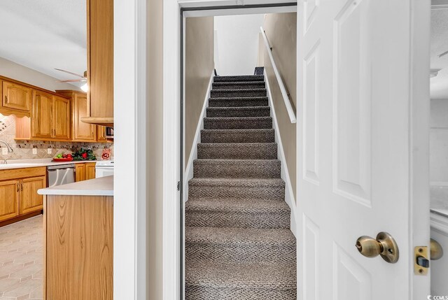 6161 Inman Cir, Conway, SC 29526 - staircase featuring a ceiling fan and tile patterned floors