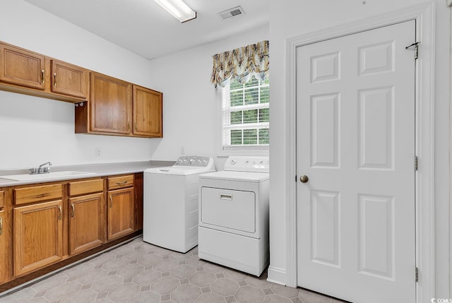 6161 Inman Cir, Conway, SC 29526 - washroom with separate washer and dryer, cabinet space, and light tile patterned floors