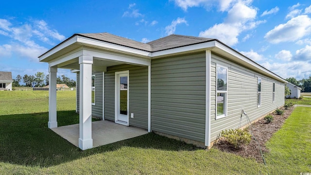 575 Strawberry Field Way, Galivants Ferry, SC 29544 - view of property exterior with a yard and a patio