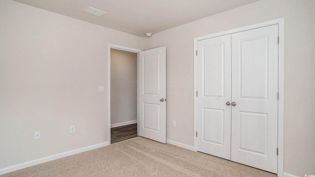 575 Strawberry Field Way, Galivants Ferry, SC 29544 - unfurnished bedroom featuring light carpet and a closet