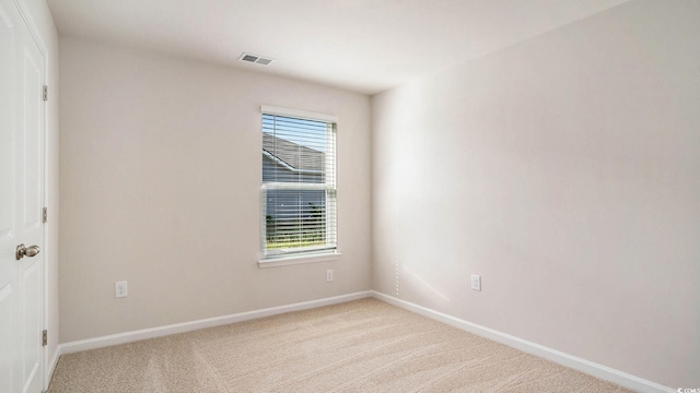 575 Strawberry Field Way, Galivants Ferry, SC 29544 - spare room featuring light colored carpet and healthy amount of natural light
