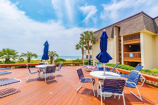 5601 N Ocean Blvd Unit A-307, Myrtle Beach, SC 29577 - wooden terrace featuring outdoor dining space