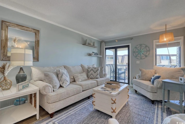 5601 N Ocean Blvd Unit A-307, Myrtle Beach, SC 29577 - living room with ornamental molding and a textured ceiling