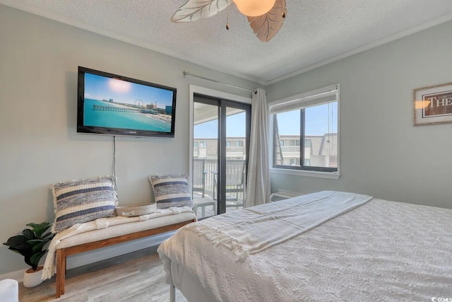 5601 N Ocean Blvd Unit A-307, Myrtle Beach, SC 29577 - bedroom with access to exterior, wood finished floors, a textured ceiling, ceiling fan, and ornamental molding