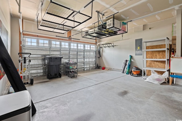 4115 Alvina Way, Myrtle Beach, SC 29579 - garage featuring electric panel and a garage door opener
