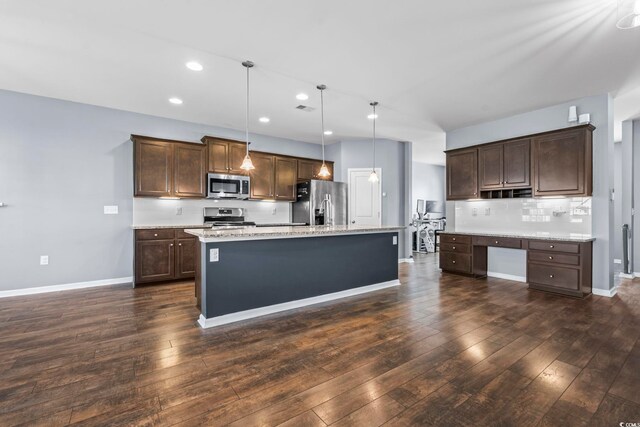 4115 Alvina Way, Myrtle Beach, SC 29579 - kitchen featuring appliances with stainless steel finishes, dark brown cabinets, recessed lighting, dark wood-type flooring, and baseboards