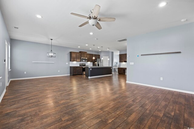 4115 Alvina Way, Myrtle Beach, SC 29579 - unfurnished living room with dark wood-style flooring, a ceiling fan, baseboards, and recessed lighting