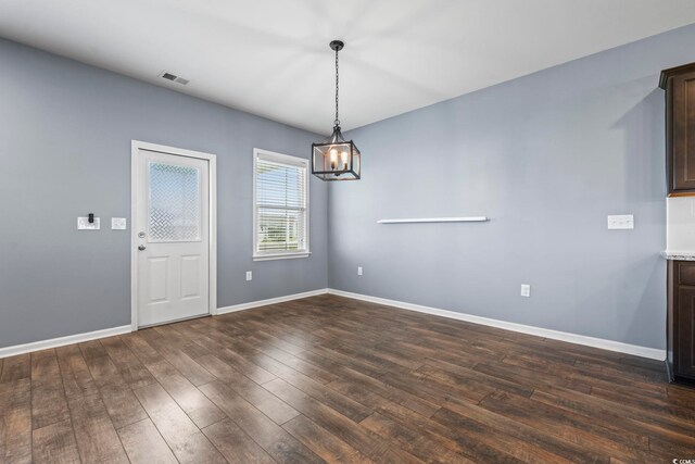 4115 Alvina Way, Myrtle Beach, SC 29579 - unfurnished dining area featuring a chandelier, dark wood finished floors, and baseboards