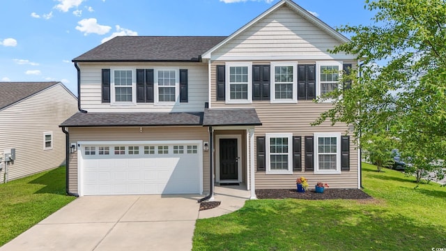 4115 Alvina Way, Myrtle Beach, SC 29579 - view of front facade with a garage, driveway, a front lawn, and roof with shingles
