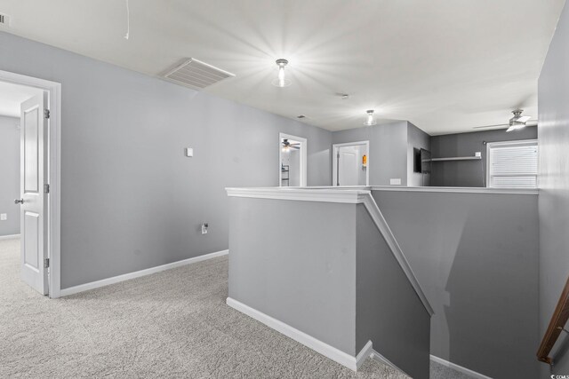 4115 Alvina Way, Myrtle Beach, SC 29579 - corridor featuring an upstairs landing, carpet floors, and baseboards