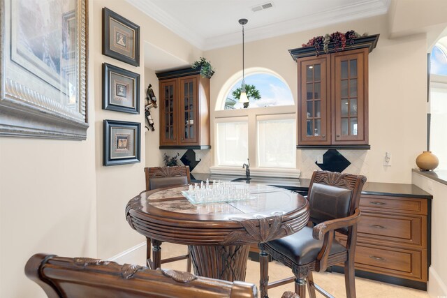 2715 Ships Wheel Dr, North Myrtle Beach, SC 29582 - dining area featuring baseboards and crown molding
