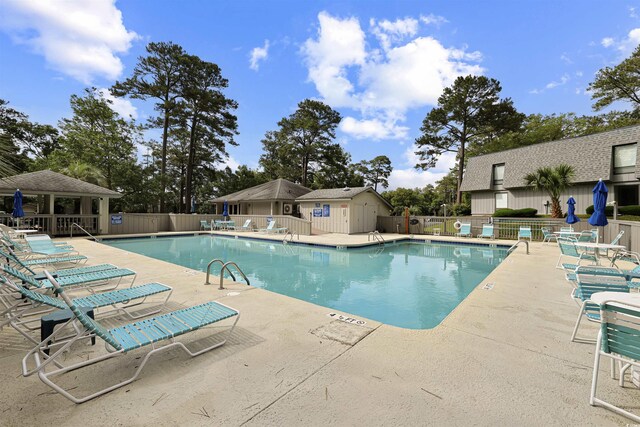 88 Salt Marsh Cir Unit 22F, Pawleys Island, SC 29585 - community pool with a patio area