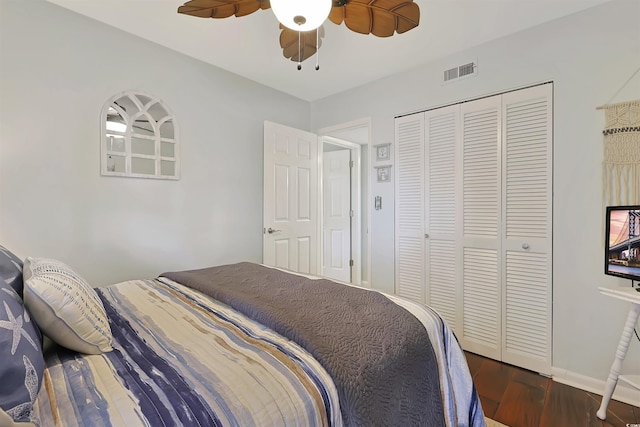 88 Salt Marsh Cir Unit 22F, Pawleys Island, SC 29585 - bedroom with dark wood-type flooring, ceiling fan, a closet, and baseboards