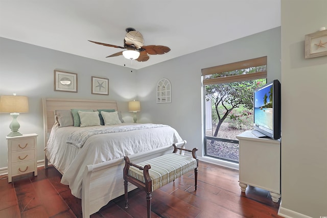 88 Salt Marsh Cir Unit 22F, Pawleys Island, SC 29585 - bedroom with dark wood-style flooring, ceiling fan, and baseboards