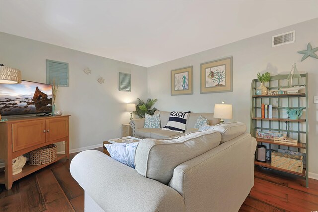 88 Salt Marsh Cir Unit 22F, Pawleys Island, SC 29585 - living area with dark wood-type flooring and baseboards