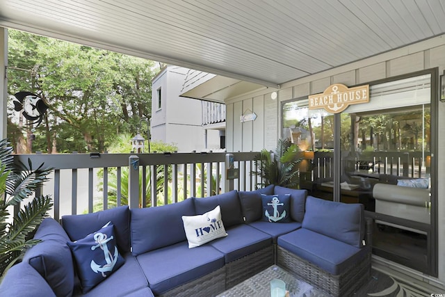 88 Salt Marsh Cir Unit 22F, Pawleys Island, SC 29585 - wooden terrace with outdoor lounge area