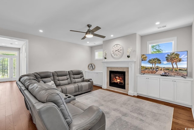 133 Deloach Trl, Pawleys Island, SC 29585 - living area with a ceiling fan, a high end fireplace, healthy amount of natural light, recessed lighting, and wood finished floors