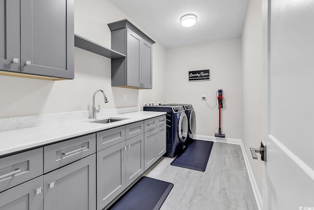 133 Deloach Trl, Pawleys Island, SC 29585 - washroom featuring cabinet space, washing machine and dryer, and baseboards