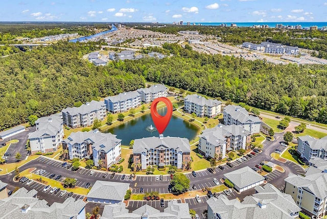 4820 Magnolia Lake Dr Unit 305, Myrtle Beach, SC 29577 - bird's eye view of a large body of water and apartment complex / building