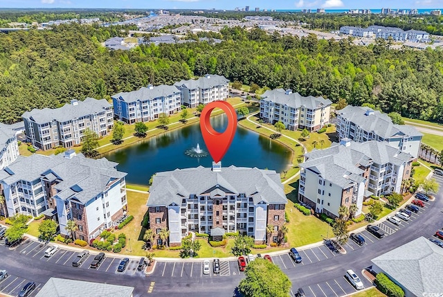 4820 Magnolia Lake Dr Unit 305, Myrtle Beach, SC 29577 - drone / aerial view of a nearby body of water and apartment complex / building