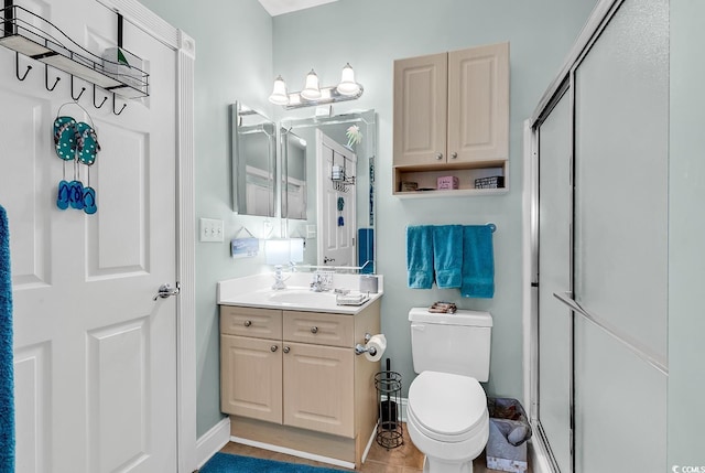 4820 Magnolia Lake Dr Unit 305, Myrtle Beach, SC 29577 - full bath featuring vanity, toilet, a shower with shower door, tile patterned floors, and baseboards