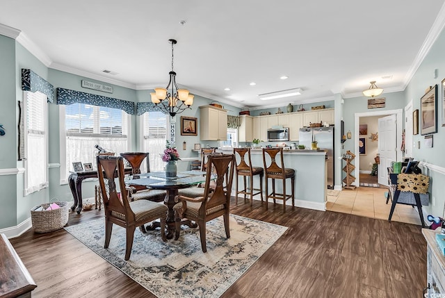 4820 Magnolia Lake Dr Unit 305, Myrtle Beach, SC 29577 - dining room featuring a chandelier, ornamental molding, light wood finished floors, baseboards, and recessed lighting