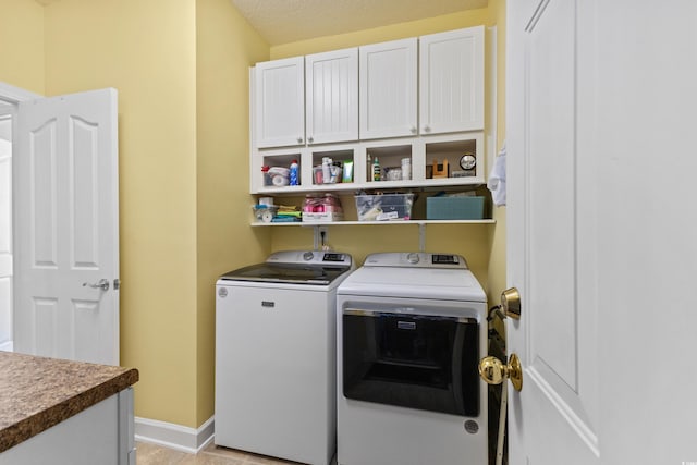 29 Saltwind Loop, Murrells Inlet, SC 29576 - washroom featuring washing machine and dryer, cabinet space, and baseboards