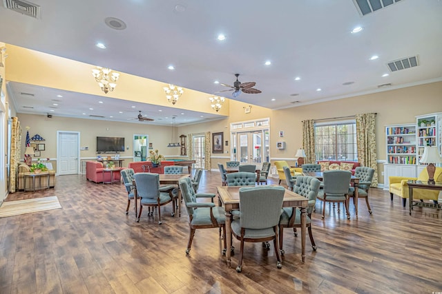 29 Saltwind Loop, Murrells Inlet, SC 29576 - dining area with a ceiling fan, wood finished floors, ornamental molding, recessed lighting, and a chandelier