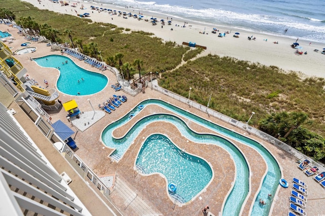 2801 S Ocean Blvd Unit 835, North Myrtle Beach, SC 29582 - drone / aerial view of a pool area and expansive coastline
