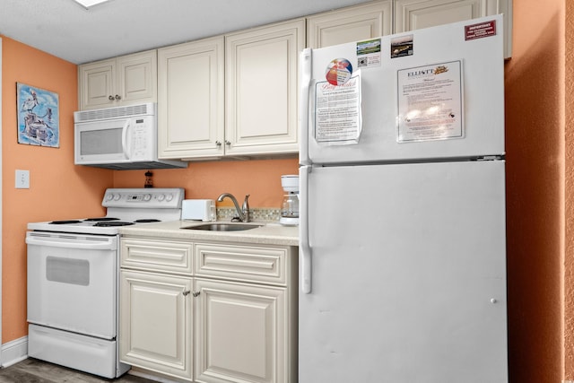 2801 S Ocean Blvd Unit 835, North Myrtle Beach, SC 29582 - kitchen with white appliances, light countertops, and white cabinetry