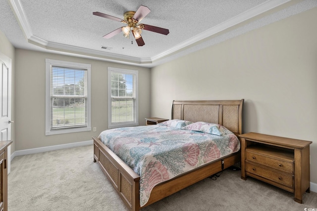 2241 Waterview Dr Unit 514, North Myrtle Beach, SC 29582 - bedroom featuring crown molding, a raised ceiling, a textured ceiling, light colored carpet, and a ceiling fan