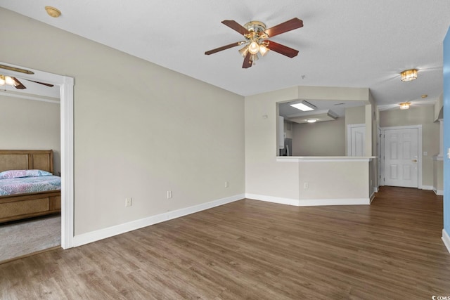 2241 Waterview Dr Unit 514, North Myrtle Beach, SC 29582 - unfurnished living room with a ceiling fan, wood finished floors, and baseboards