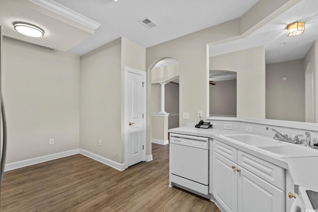 2241 Waterview Dr Unit 514, North Myrtle Beach, SC 29582 - bathroom featuring wood finished floors, vanity, baseboards, and a textured ceiling