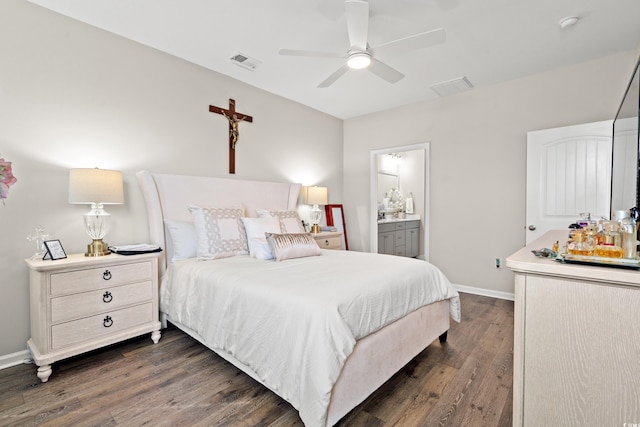 915 Sorano St, Myrtle Beach, SC 29579 - bedroom with dark wood-style floors, baseboards, ensuite bath, and a ceiling fan