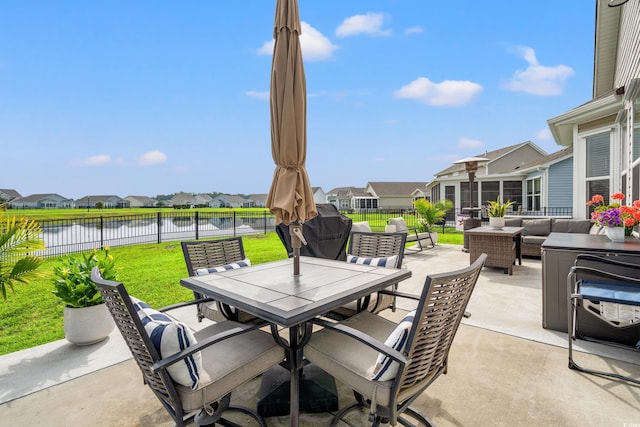915 Sorano St, Myrtle Beach, SC 29579 - view of patio featuring outdoor dining space, a residential view, an outdoor hangout area, a water view, and area for grilling