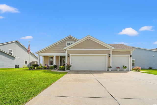 915 Sorano St, Myrtle Beach, SC 29579 - view of front facade with a front lawn, concrete driveway, and an attached garage