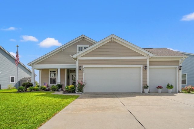 915 Sorano St, Myrtle Beach, SC 29579 - view of front of property with concrete driveway, a front lawn, and a garage