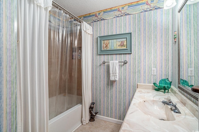 705 11th Ave S, North Myrtle Beach, SC 29582 - bathroom with tile patterned floors, shower / tub combo, a textured ceiling, vanity, and baseboards