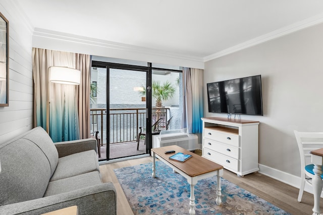 7200 N Ocean Blvd Unit 260, Myrtle Beach, SC 29572 - living area with crown molding, wood finished floors, and a wall unit AC