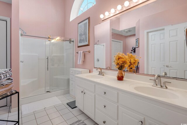 168 Mackinley Cir, Pawleys Island, SC 29585 - full bath with a stall shower, double vanity, tile patterned floors, and a towering ceiling
