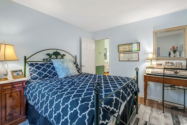 168 Mackinley Cir, Pawleys Island, SC 29585 - bedroom with wood finished floors and baseboards