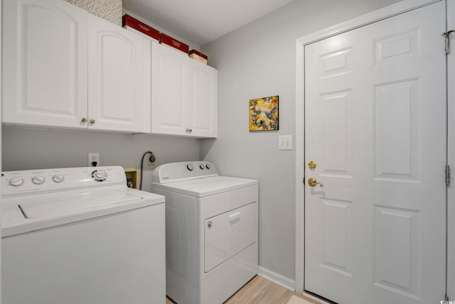 168 Mackinley Cir, Pawleys Island, SC 29585 - washroom with separate washer and dryer, cabinet space, and light wood finished floors