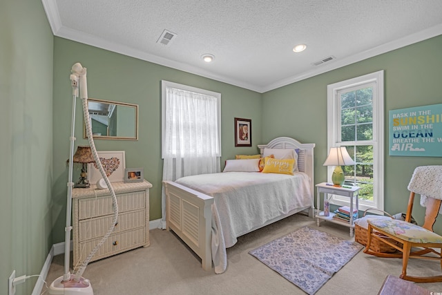 3231 Center Rd, Georgetown, SC 29440 - bedroom with ornamental molding, light colored carpet, a textured ceiling, baseboards, and recessed lighting