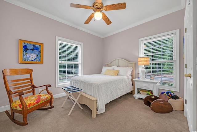 3231 Center Rd, Georgetown, SC 29440 - carpeted bedroom with crown molding, multiple windows, baseboards, and ceiling fan