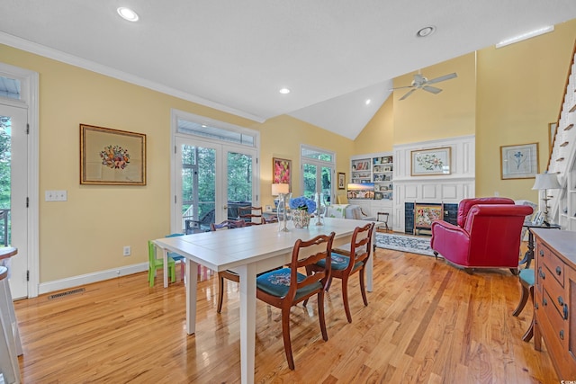 3231 Center Rd, Georgetown, SC 29440 - dining area featuring a fireplace, light wood-style floors, recessed lighting, baseboards, and ceiling fan