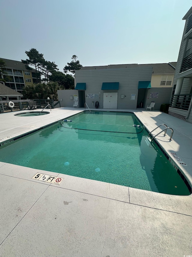 201 Hillside Dr N Unit 111, North Myrtle Beach, SC 29582 - community pool with a community hot tub and a patio