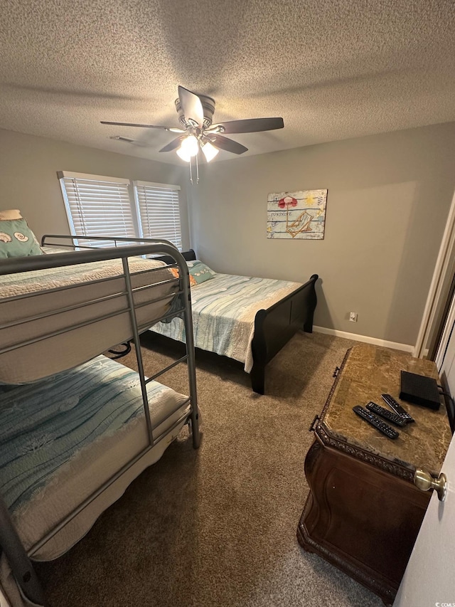 201 Hillside Dr N Unit 111, North Myrtle Beach, SC 29582 - bedroom featuring carpet, a textured ceiling, and a ceiling fan