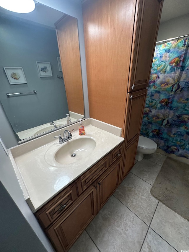 201 Hillside Dr N Unit 111, North Myrtle Beach, SC 29582 - full bath with vanity, toilet, tile patterned floors, and curtained shower