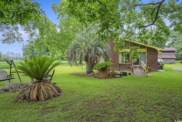 1731 Lee Ln, Longs, SC 29568 - view of green lawn with a patio area